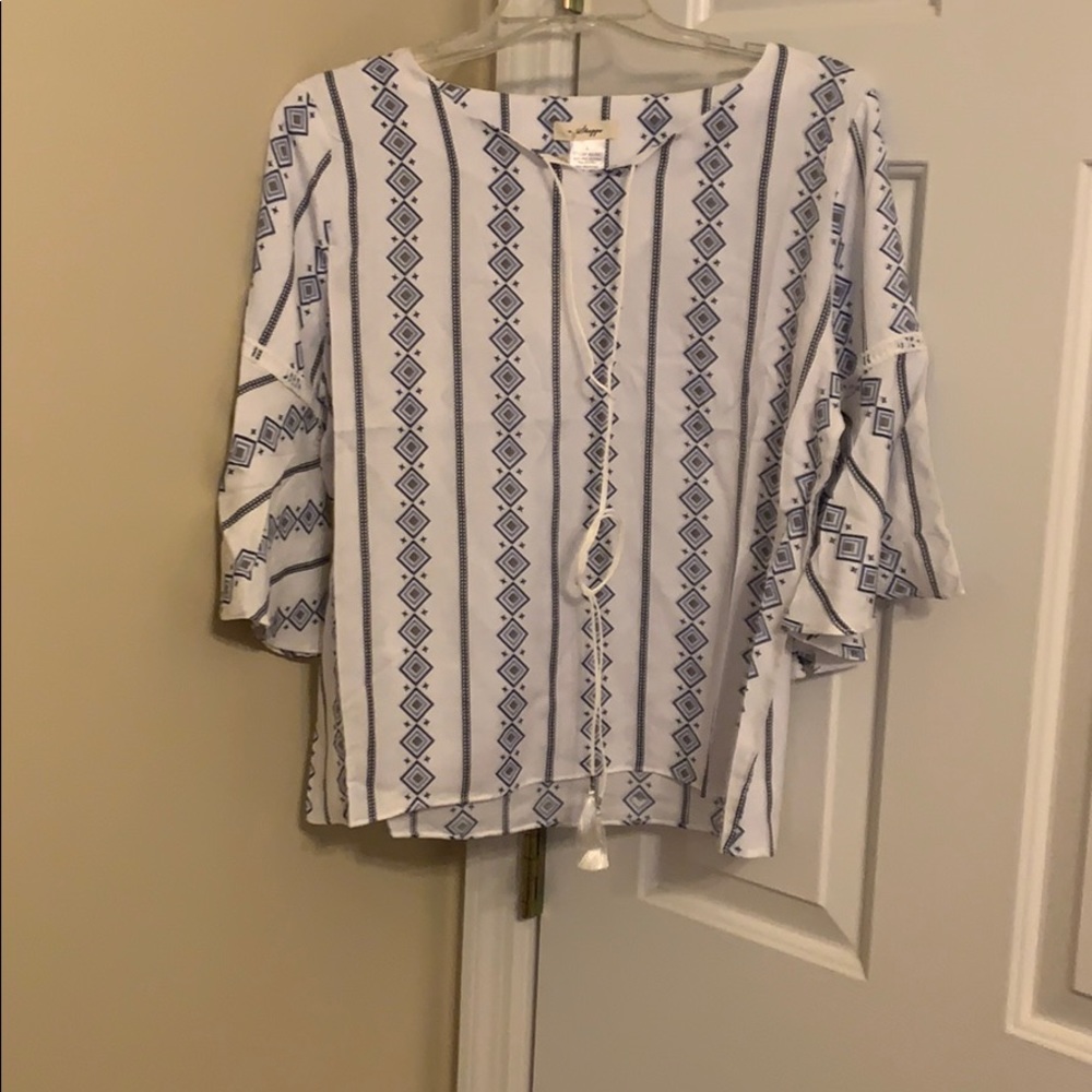 A Top by a SHAPPE BLUE & White .